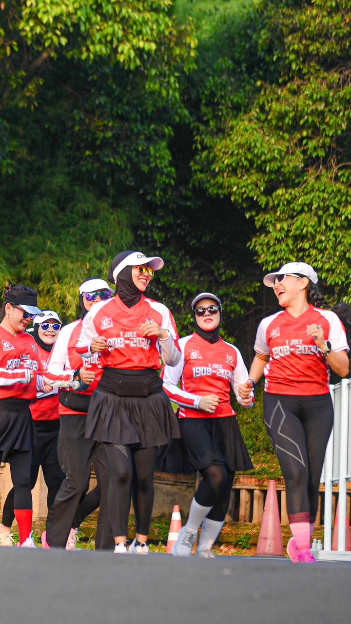 a group of women sitting and drinking chocolate milk